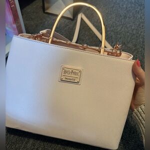 Loungefly Harry Potter Deathly Hollows Elder Wand Handbag. Great Condition